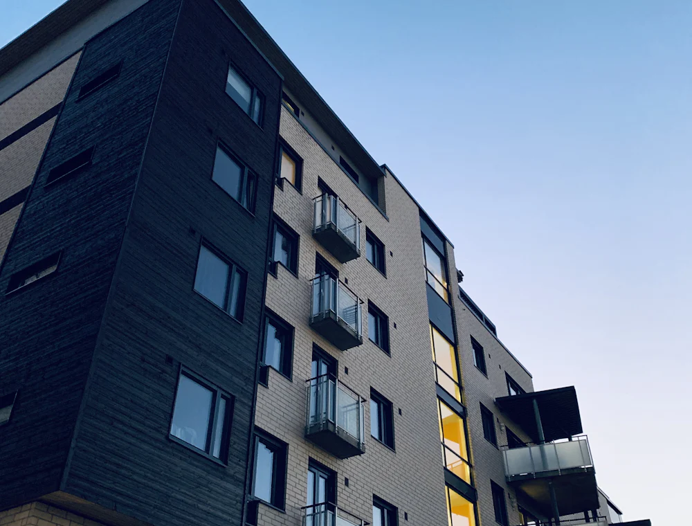 An apartment building against a clear sky