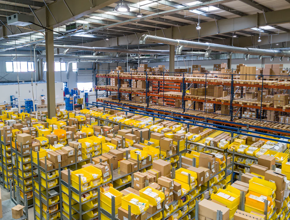 A fulfilment warehouse stacked with packages